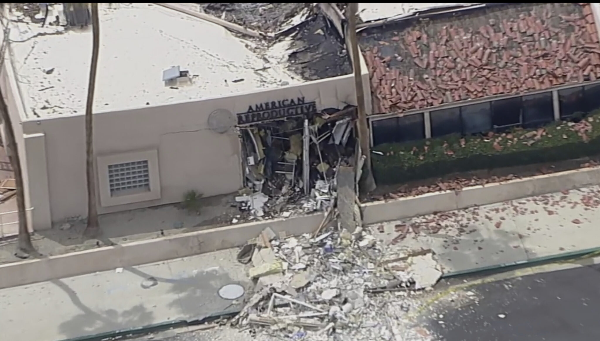 Explosion at Palm Springs Fertility Clinic Kills 1, Injures 4 (Photo: Debris covers the ground after an explosion on Saturday, May 17, 2025 in Palm Springs, Calif. (ABC7 Los Angeles via AP)