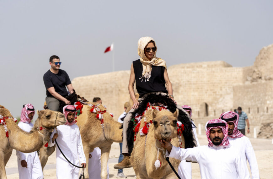 Kristi Noem Rides a Camel on Diplomatic Mission to Israel (Photo: Homeland Security Secretary Kristi Noem rides a camel after a tour of Qal'at al-Bahrain Fort, Sunday, May 25, 2025, near Manama, Bahrain. (AP Photo/Alex Brandon, Pool)