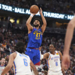 Murray and Porter Power Nuggets to 113-104 Win Over Thunder (Photo: Denver Nuggets guard Jamal Murray (27) goes up for a basket between Oklahoma City Thunder forwards Jaylin Williams (6) and Jalen Williams (8) in the first half of Game 3 in the Western Conference semifinals of the NBA basketball playoffs Friday, May 9, 2025, in Denver. (AP Photo/David Zalubowski)