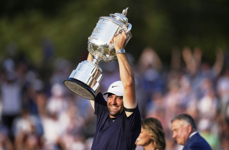 Scottie Scheffler Wins First PGA Championship After Tough Year (Photo: Scottie Scheffler holds the Wanamaker trophy after winning the PGA Championship golf tournament at the Quail Hollow Club, Sunday, May 18, 2025, in Charlotte, N.C. (AP Photo/George Walker IV)
