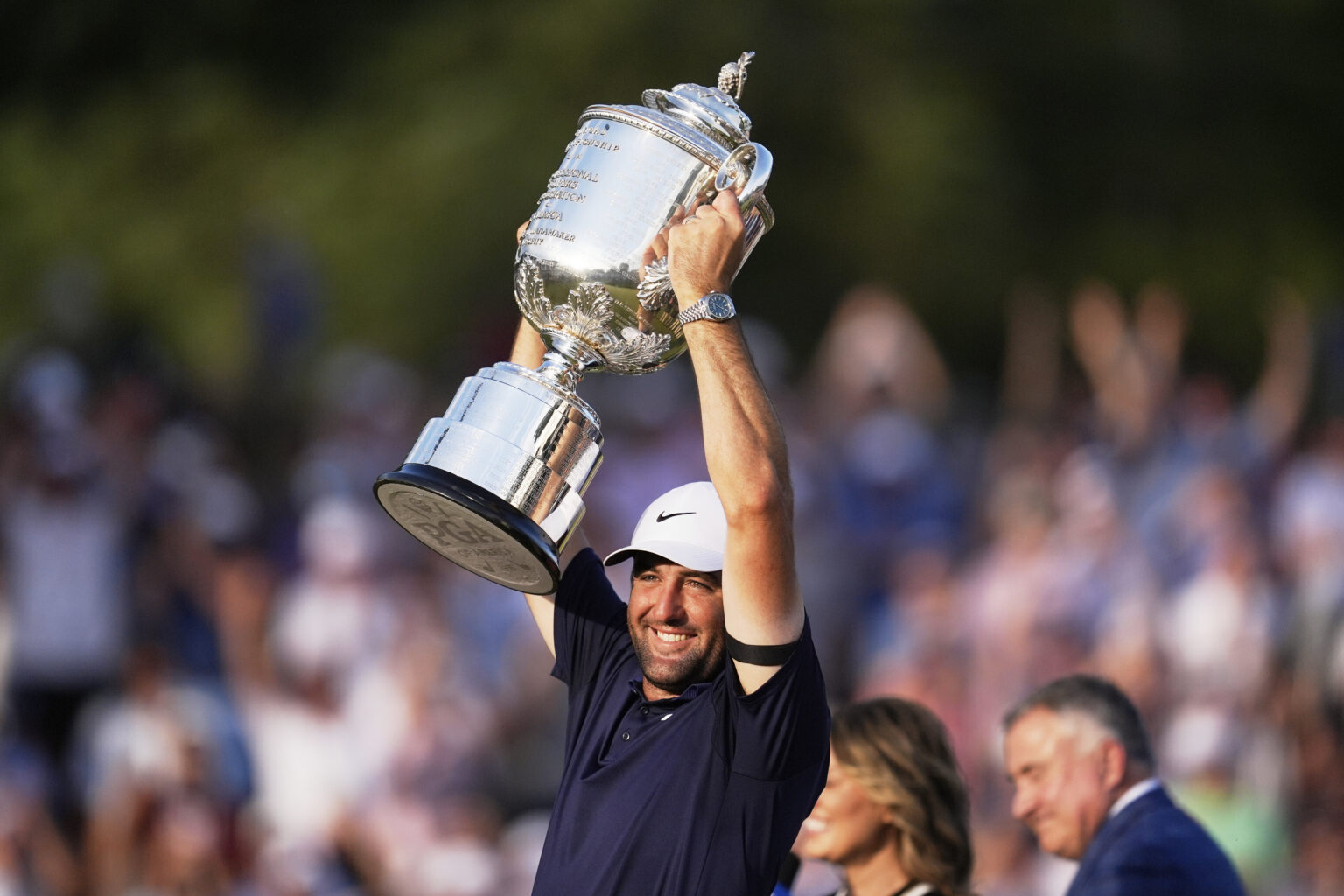 Scottie Scheffler Wins First PGA Championship After Tough Year (Photo: Scottie Scheffler holds the Wanamaker trophy after winning the PGA Championship golf tournament at the Quail Hollow Club, Sunday, May 18, 2025, in Charlotte, N.C. (AP Photo/George Walker IV)