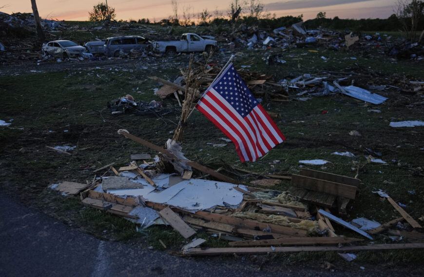 Severe Weather Threat Looms Over Memorial Day Weekend (Photo: An American flag is posted near destroyed homes after a tornado passed through the area on May 17, 2025, in London, Ky. (AP Photo/Carolyn Kaster, File)