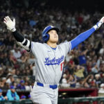 Shohei Ohtani’s Clutch Homer Seals Dodgers’ Wild 14-11 Victory (Photo: Los Angeles Dodgers' Shohei Ohtani celebrates a three run home run against for the Arizona Diamondbacks during the ninth inning of a baseball game Friday, May 9, 2025, in Phoenix. (AP Photo/Darryl Webb)