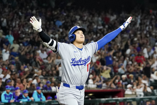 Shohei Ohtani’s Clutch Homer Seals Dodgers’ Wild 14-11 Victory (Photo: Los Angeles Dodgers' Shohei Ohtani celebrates a three run home run against for the Arizona Diamondbacks during the ninth inning of a baseball game Friday, May 9, 2025, in Phoenix. (AP Photo/Darryl Webb)