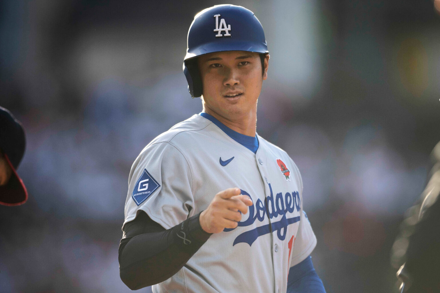 Ohtani Hits Leadoff Homer in Back-to-Back Games Again (Photo: Los Angeles Dodgers' Shohei Ohtani points after a walk during the fifth inning of a baseball game against the Cleveland Guardians, Monday, May 26, 2025, in Cleveland. (AP Photo/David Dermer)