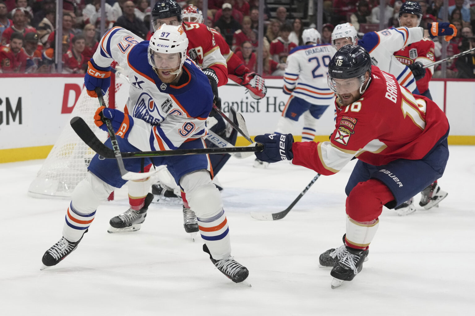 Panthers Win 3rd Game In Stanley Cup Finals (Photo: Florida Panthers center Aleksander Barkov (16) defends Edmonton Oilers center Connor McDavid (97) during the first period of Game 3 of the NHL Stanley Cup final Monday, June 9, 2025, in Sunrise, Fla. (AP Photo/Lynne Sladky)