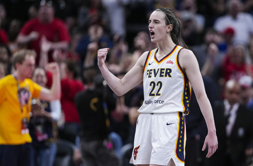 Caitlin Clark Dramatic Injury Shakes Up Indiana Fever Season (Photo: Indiana Fever guard Caitlin Clark (22) reacts after a basket against the New York Liberty in the second half of a WNBA basketball game in Indianapolis, Saturday, May 24, 2025. (AP Photo/Michael Conroy)