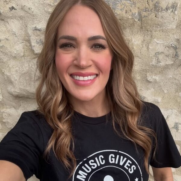 Carrie Underwood smiling with brunette hair in selfie promoting St. Jude fundraiser